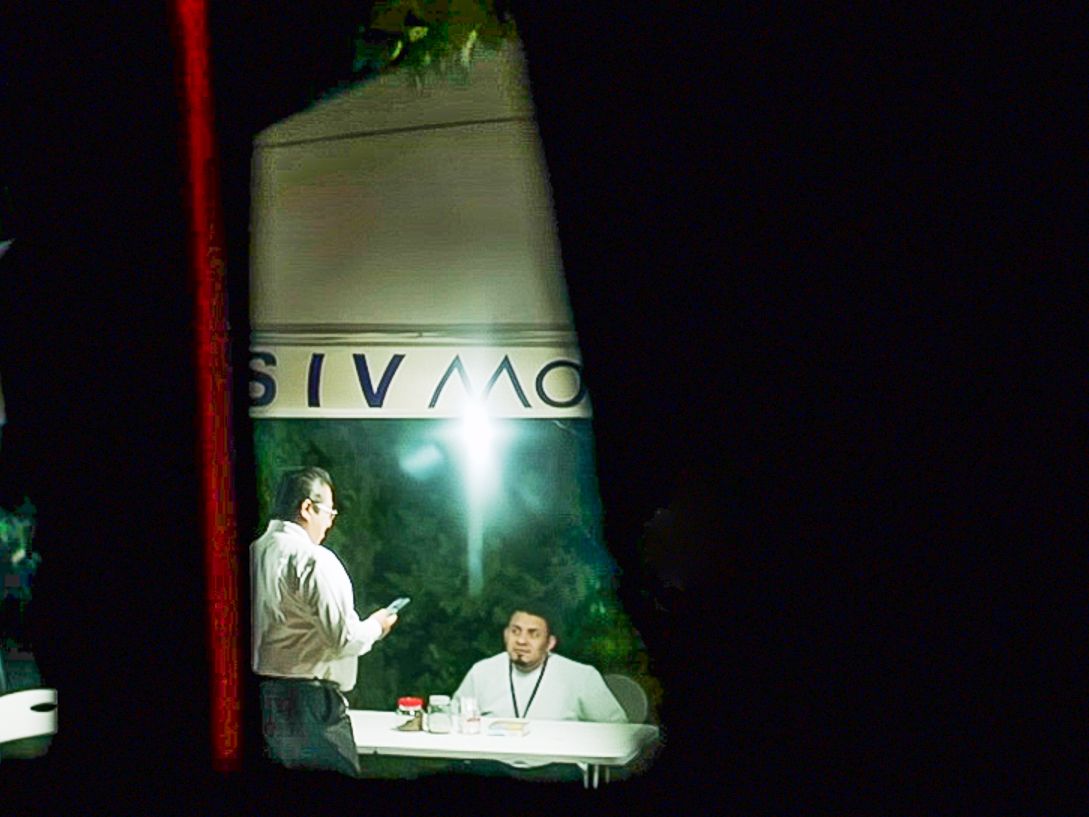 Border officials are seen stationed at a checkpoint.